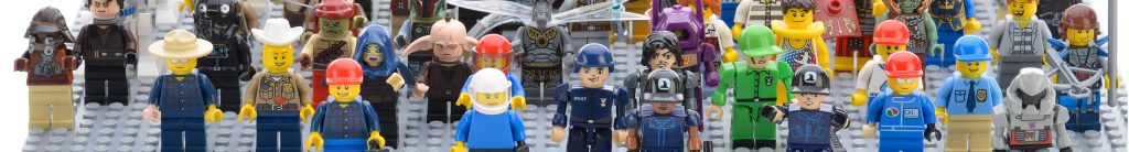 Lego construction club with children building and playing with colorful Lego bricks.