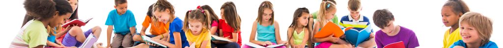 Children engaging in literacy activities during a group session.